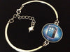Blue Police Box Design Domed Charm on a Silver Adjustable Cuff Bracelet