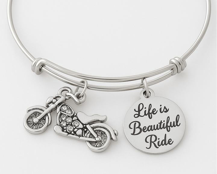Silver bracelet with motorcycle charm and &
