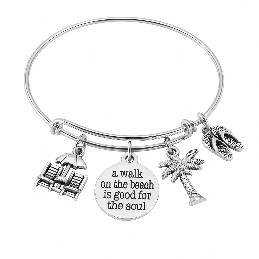 Silver bracelet with beach-themed charms on a white background