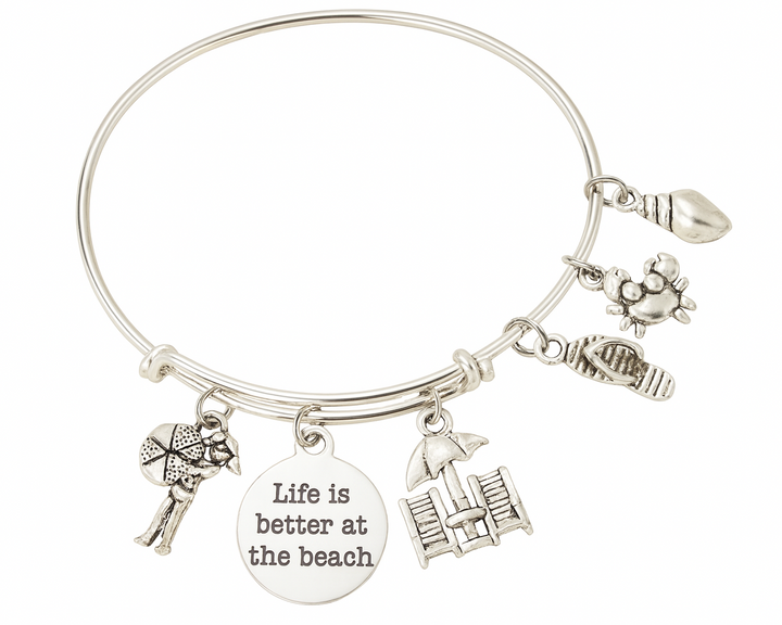 Silver bracelet with beach-themed charms and a &