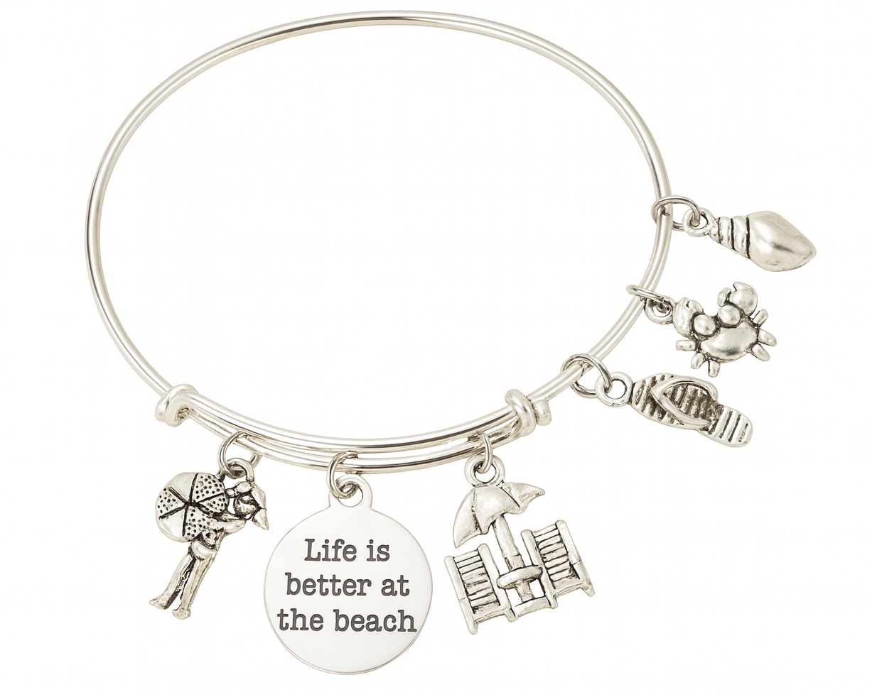 Silver bracelet with beach-themed charms and a 'Life is better at the beach' tag on a white background