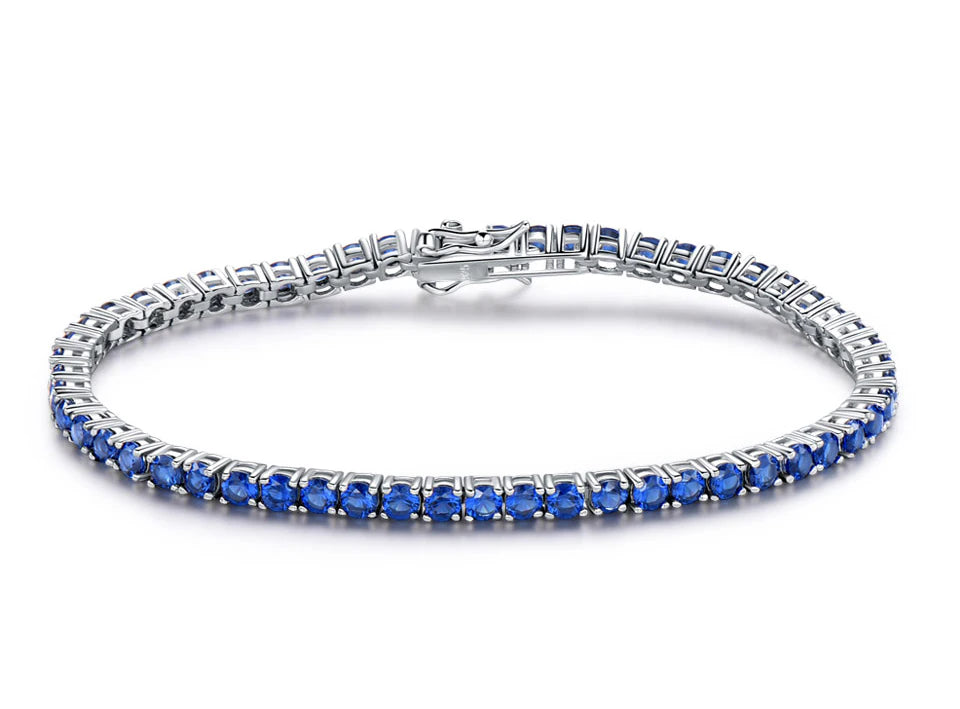 Blue sapphire tennis bracelet with round 3mm stones set in sterling silver and platinum plating