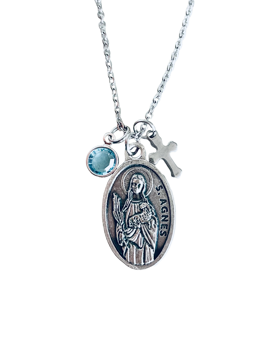 Catholic jewelry gift for girls featuring saint medal and Swarovski crystal