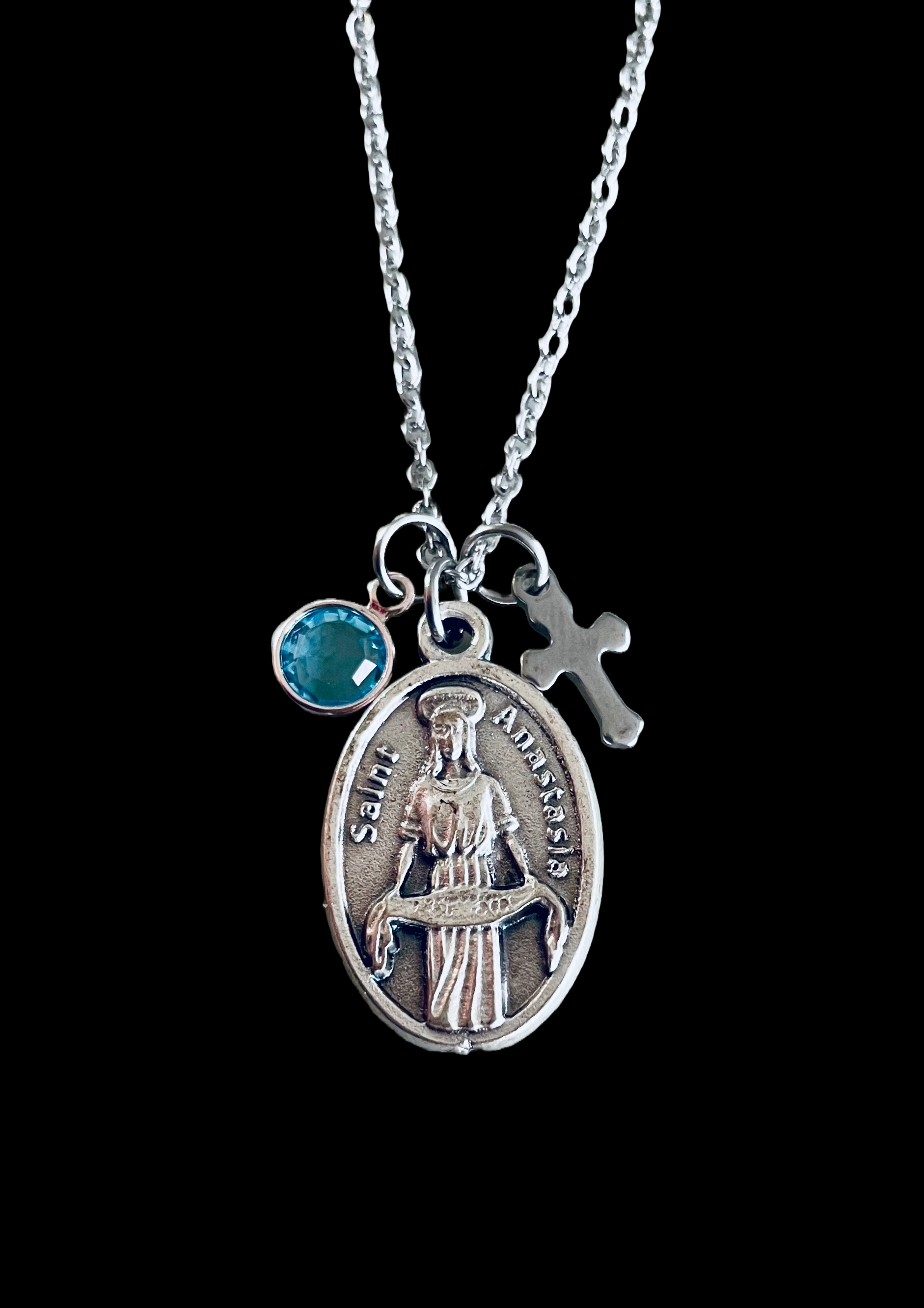Saint Anastasia charm necklace with birthstone and cross on stainless steel chain