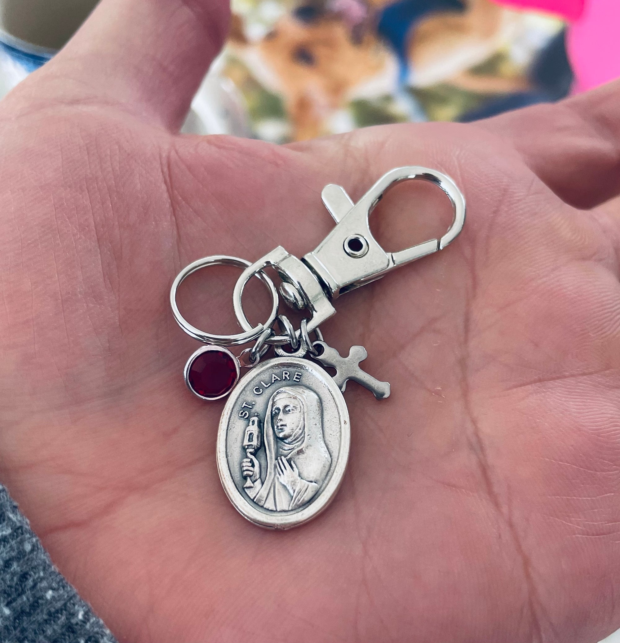 Purse charm with Saint Helen medal, cross, and birthstone for spiritual support