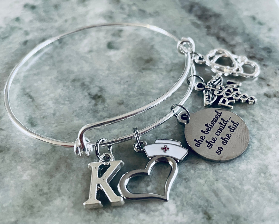 Personalized  RN nurse charm bracelet with stethoscope, heart, nurse cap, 