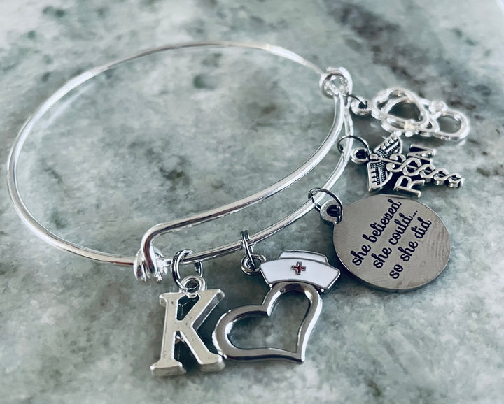 Personalized  RN nurse charm bracelet with stethoscope, heart, nurse cap, 