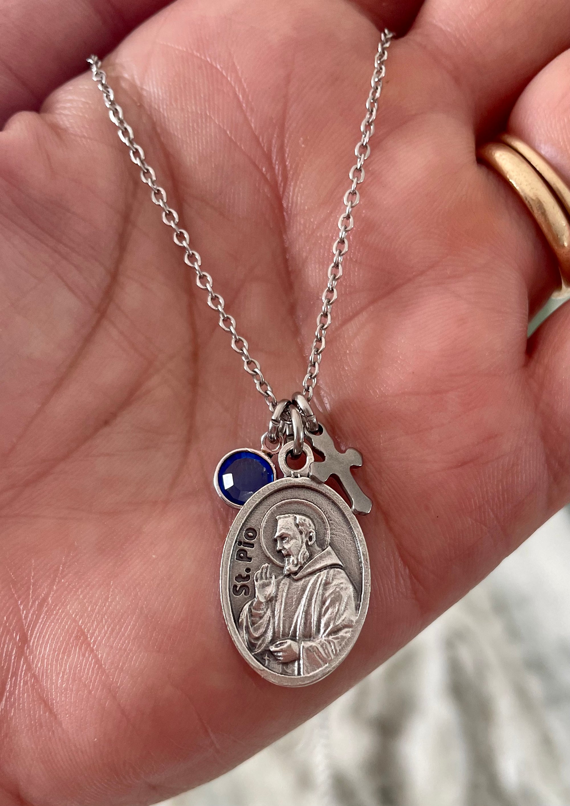 Saint Pio medal necklace with birthstone and cross