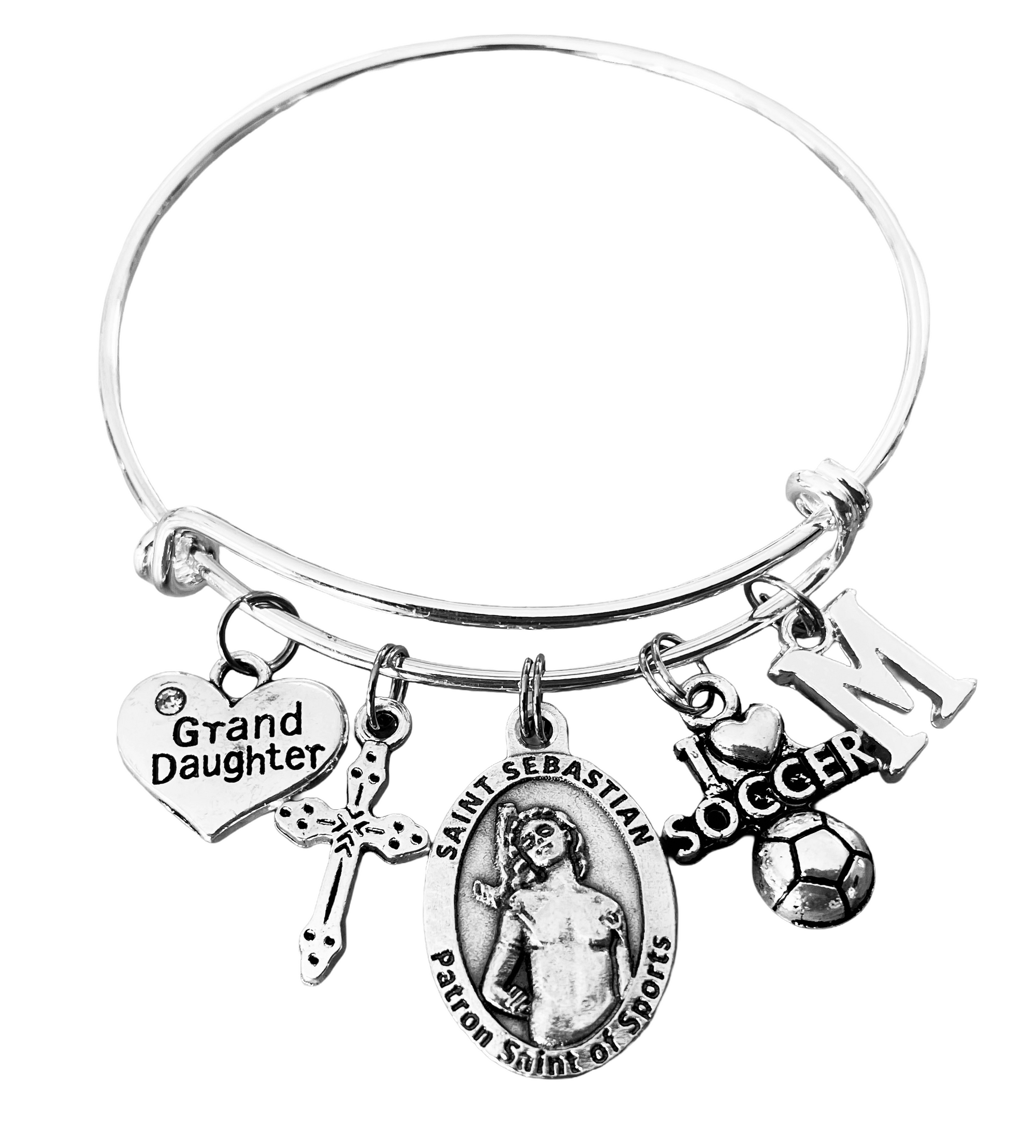 randdaughter charm bracelet with Saint Sebastian medal, soccer charm, cross, initial, and heart Grand Daughter charm on silver expandable bangle