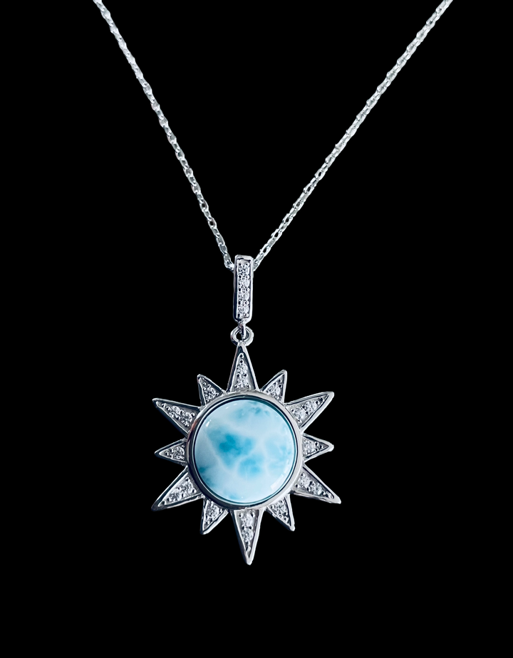 Sunshine Larimar necklace in sterling silver with round blue Larimar stone, sparkling sun ray pendant and pavé bail 