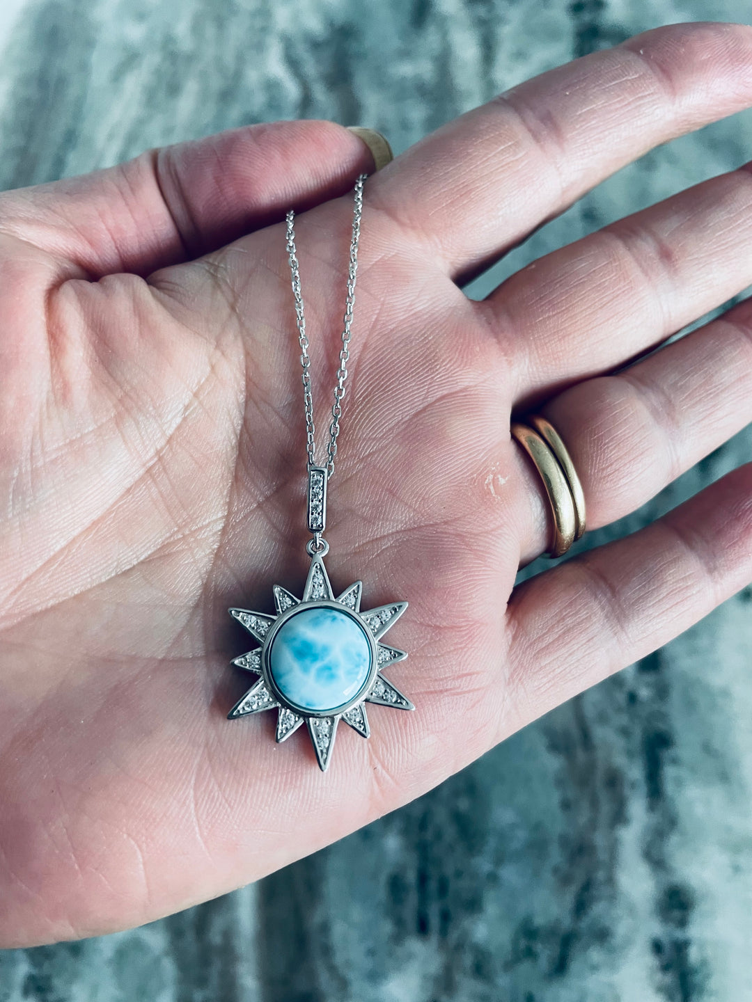 25mm Sunshine Larimar necklace in sterling silver with round blue Larimar stone, sparkling sun ray pendant and pavé bail 
