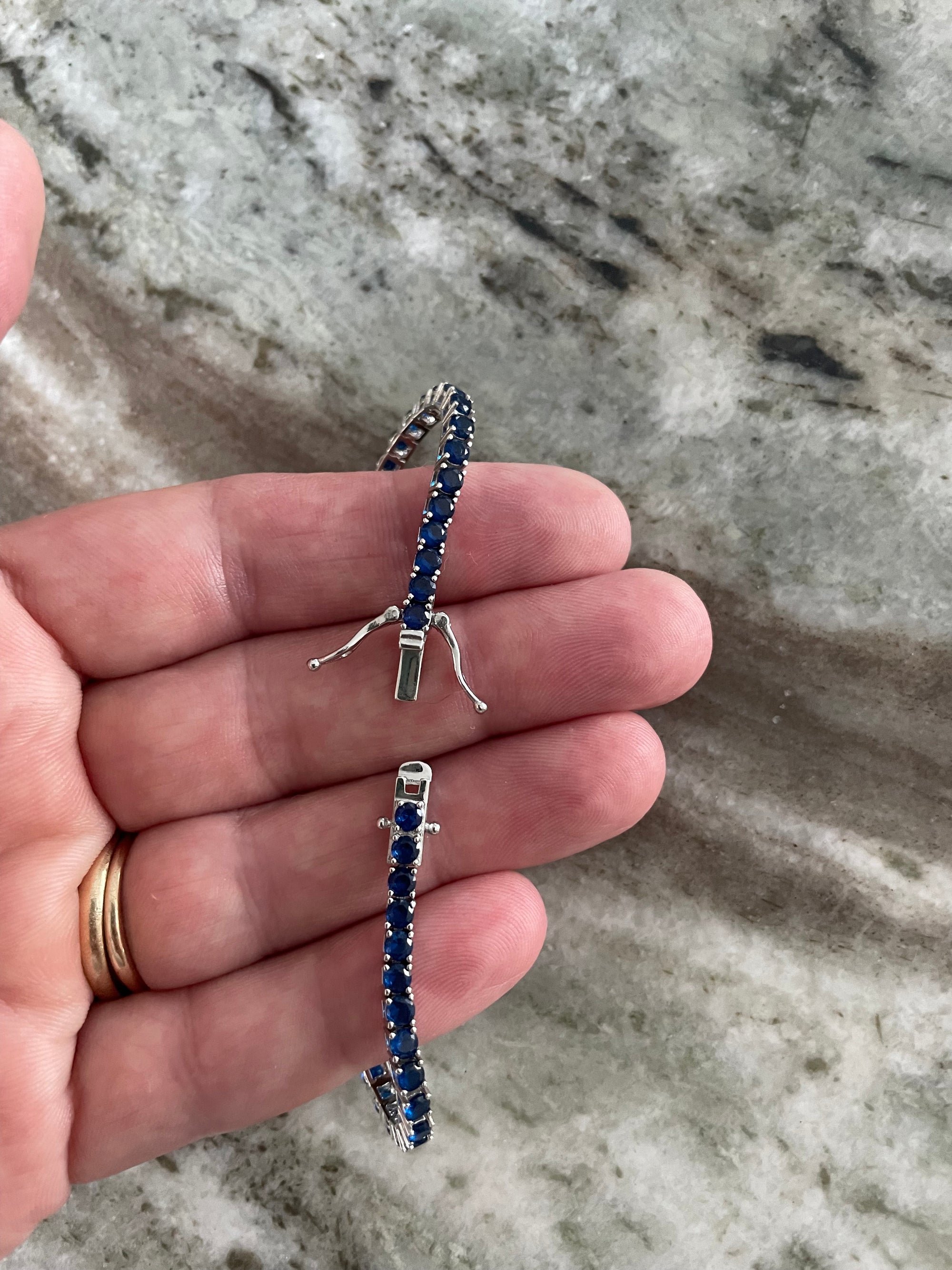 sterling silver bracelet with blue sapphires and triple locking clasp