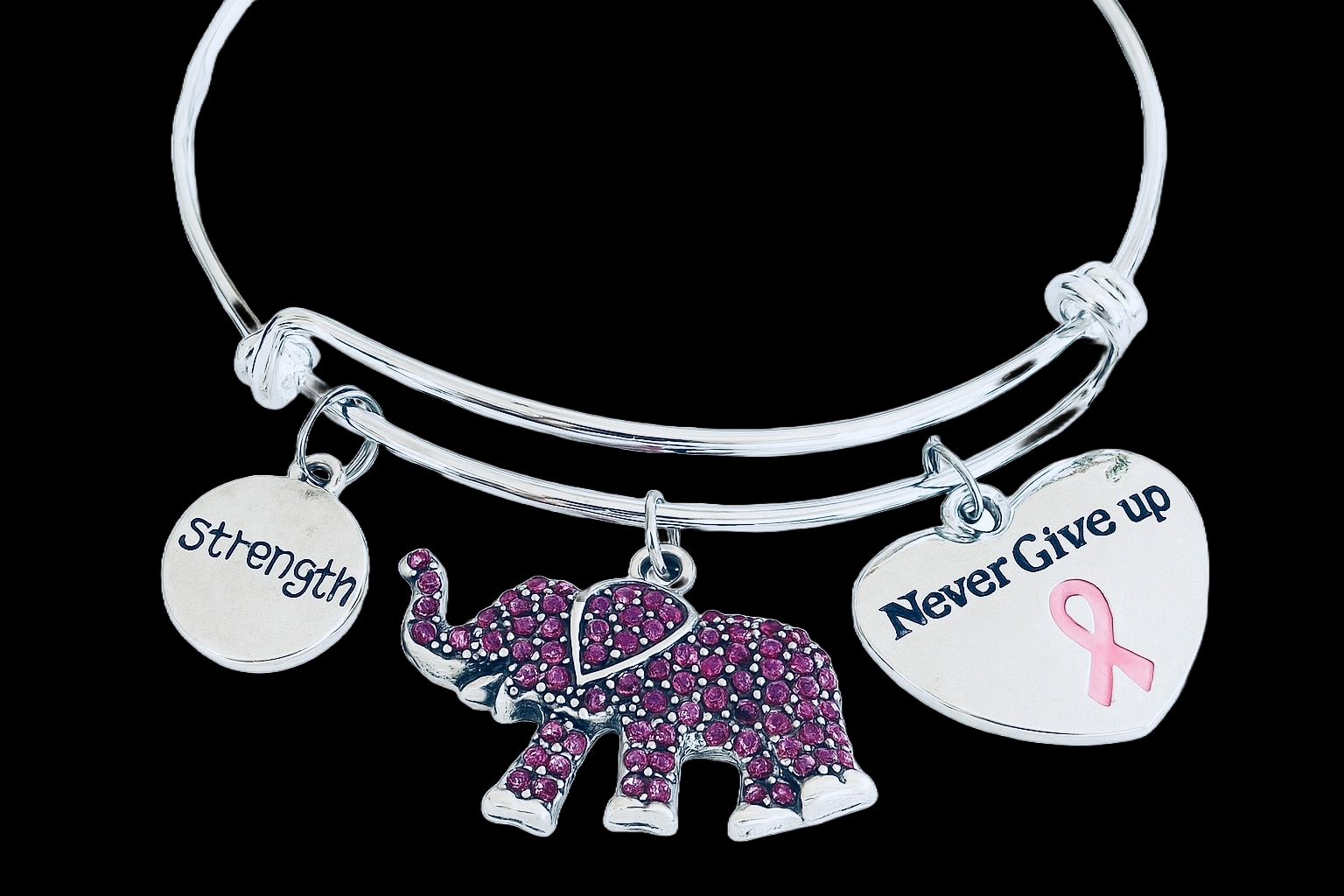 Silver charm bracelet with pink rhinestone elephant, strength disc, and Never Give Up heart charm with pink ribbon