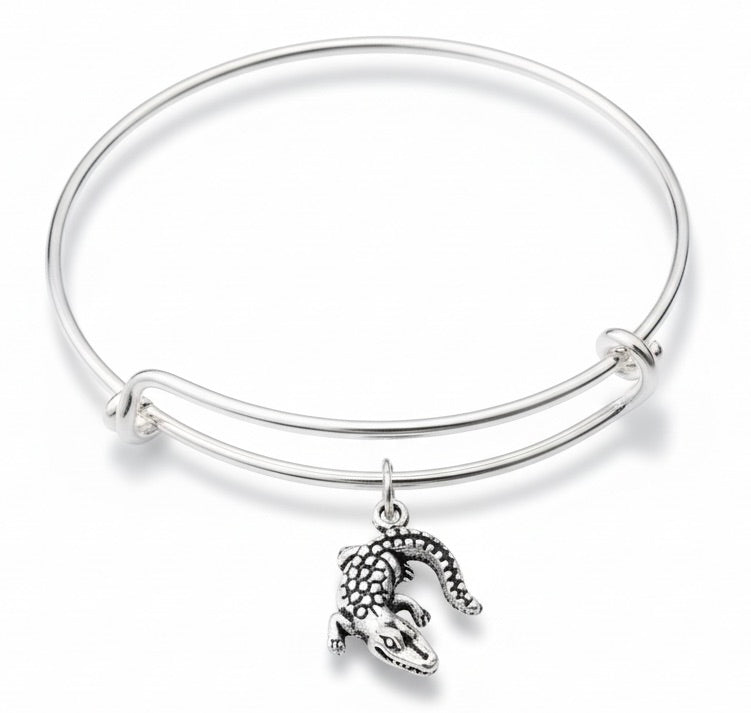 Silver alligator charm expandable bangle bracelet with detailed scaly gator charm on polished silver wire bangle by Jules Obsession