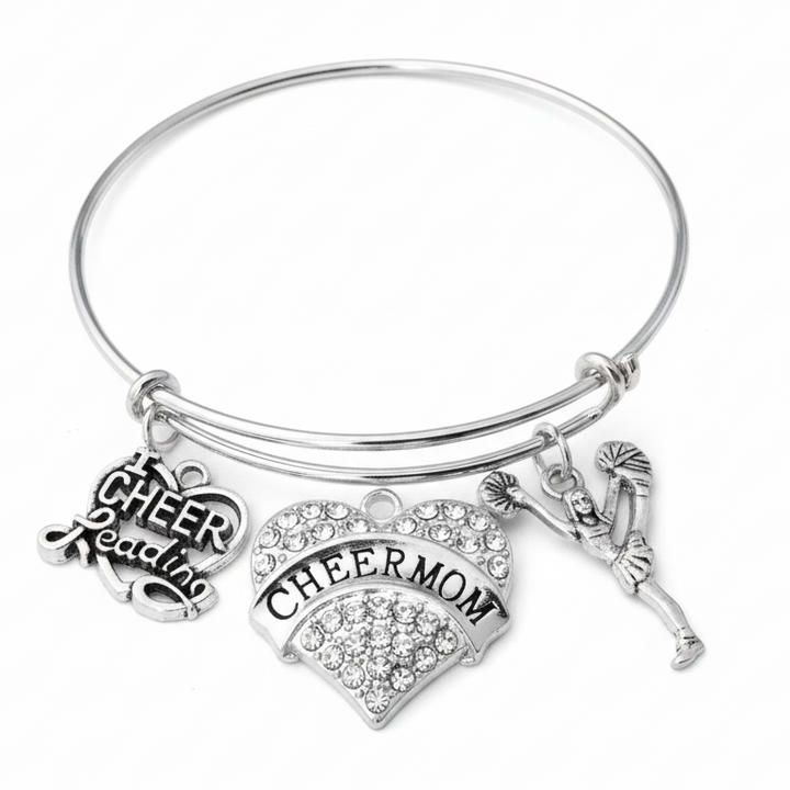 Silver expandable charm bangle bracelet with crystal pavé CHEERMOM heart charm, I Love Cheerleading heart charm, and cheerleader silhouette charm — cheerleading gift for cheer moms by Jules Obsession