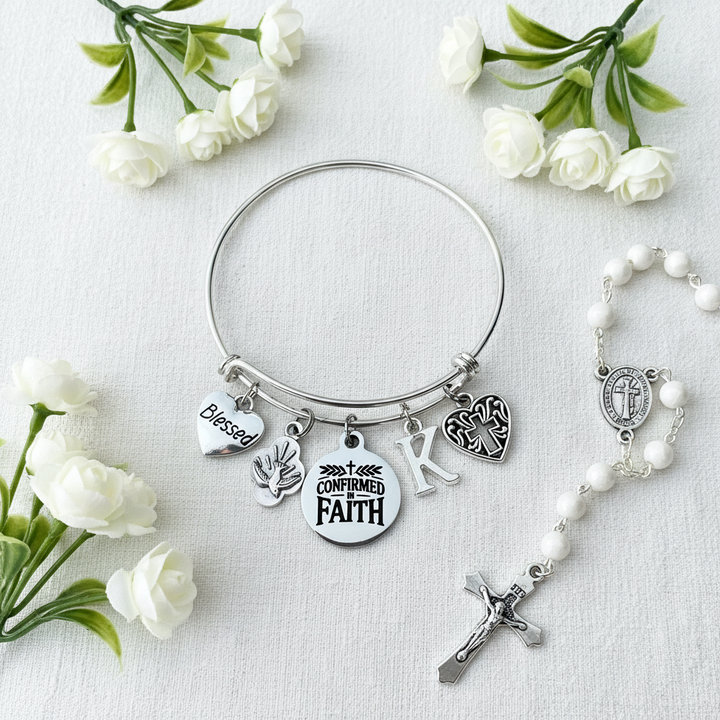 Confirmation Gift for Girls Silver adjustable bangle bracelet featuring a stainless steel Confirmed in Faith medal, silver-plated Blessed heart charm, Holy Spirit Dove charm, Filigree Heart Cross charm, and personalized initial charm