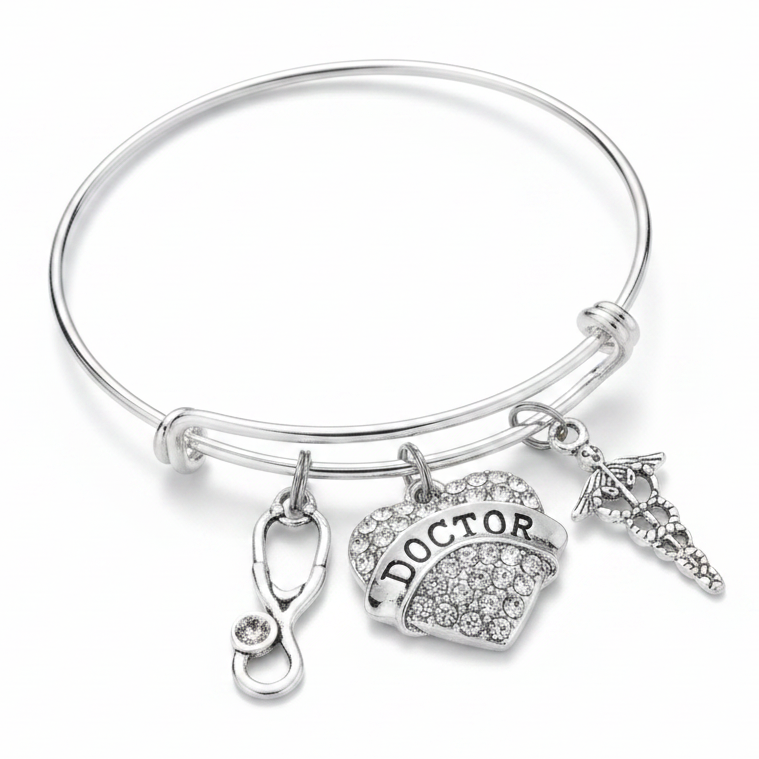 Silver expandable bangle bracelet with crystal rhinestone Doctor heart charm, stethoscope charm, and caduceus medical symbol charm — personalized doctor gift bracelet by Jules Obsession"