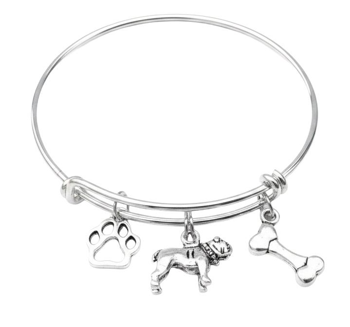 Silver expandable bangle bracelet with bulldog, paw print, and bone charms on white background — handcrafted dog lover gift jewelry by Jules Obsession"
