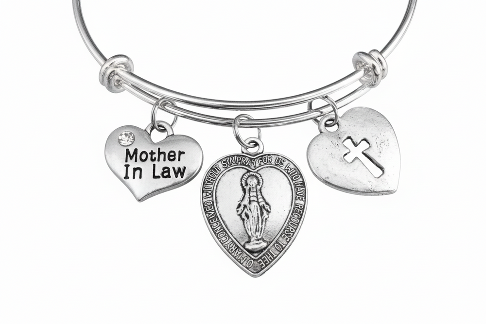Silver bracelet with 'Mother In Law' heart charm and religious pendant 