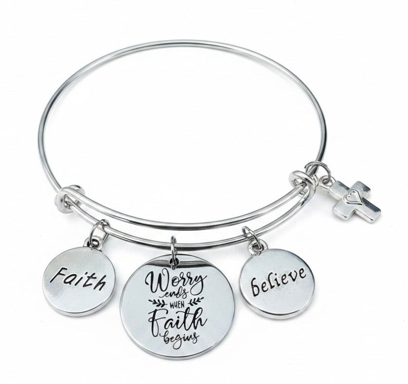 Silver-plated expandable bangle bracelet with Faith, Worry Ends When Faith Begins, and Believe charm discs and cross charm with heart cutout — Christian gift for women by Jules Obsession