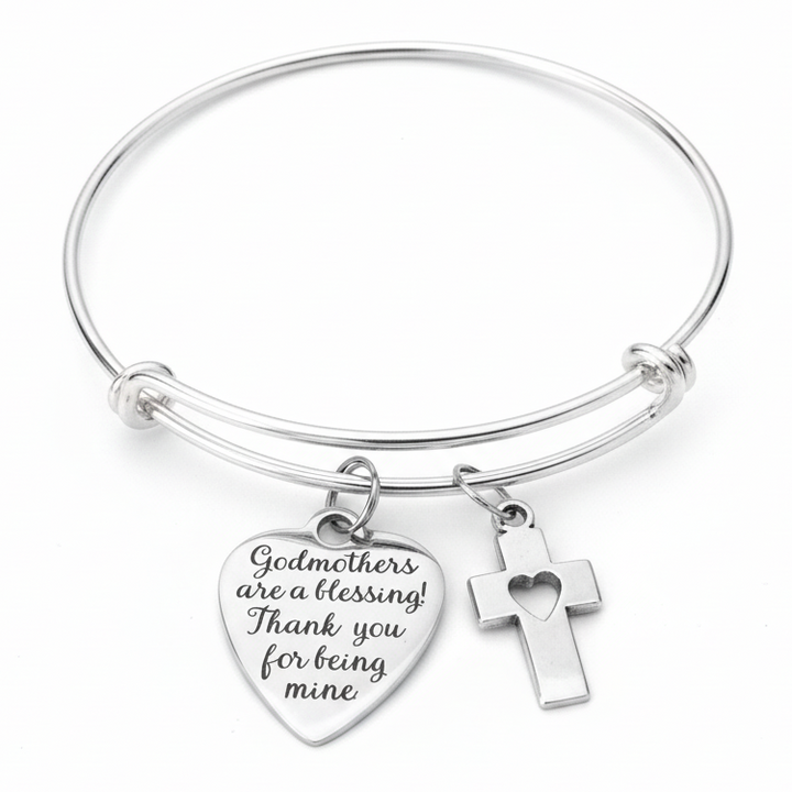 Professional product photo of silver godmother charm bracelet with engraved blessing heart charm and cross with heart charm on white background — expandable bangle godmother jewelry gift