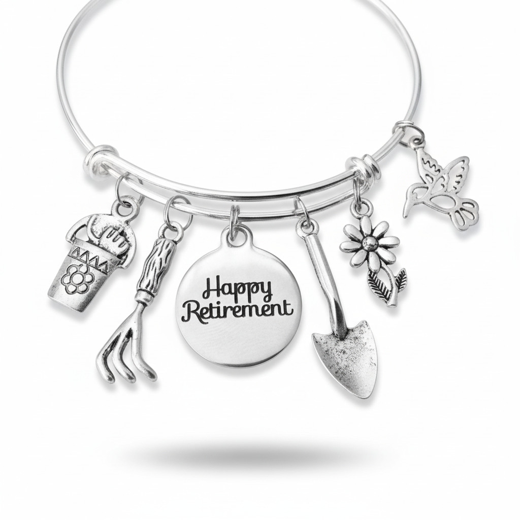 Happy Retirement garden charm bracelet with hummingbird, daisy, rake, trowel, flower pot and Happy Retirement disc charms on silver expandable bangle by Jules Obsession