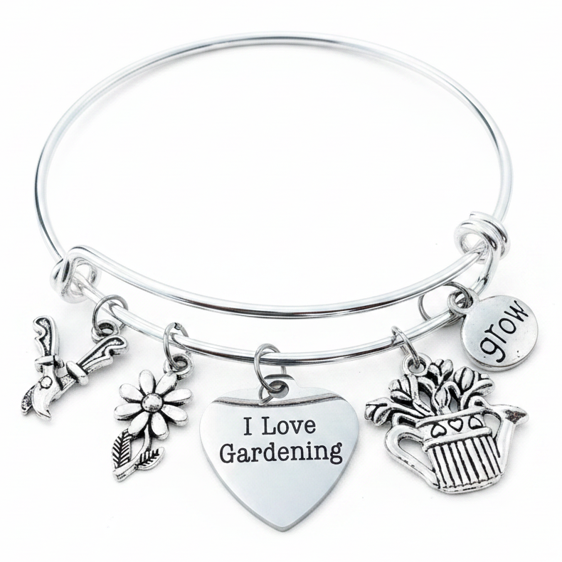 Silver expandable bangle bracelet with I Love Gardening heart charm, Grow disc, daisy flower, flower pot, and pruning shears charms — gardener gift jewelry by Jules Obsession