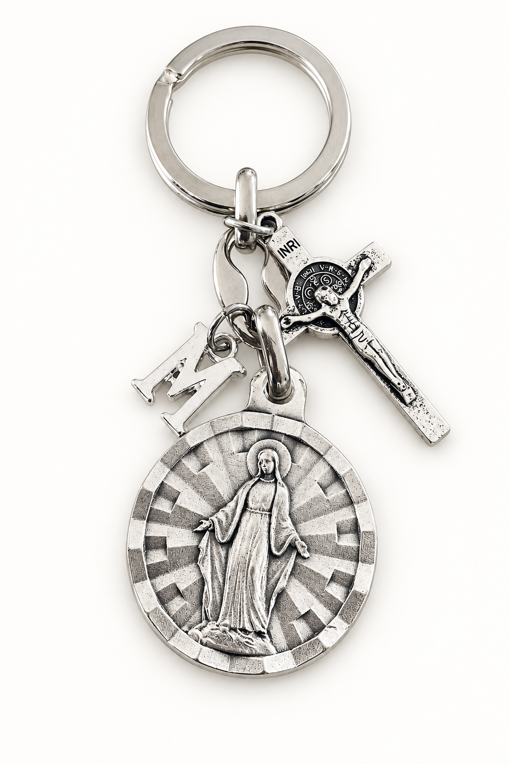 Silver-tone keychain with a Virgin Mary medal, detailed crucifix, and smaller stamped religious charms.