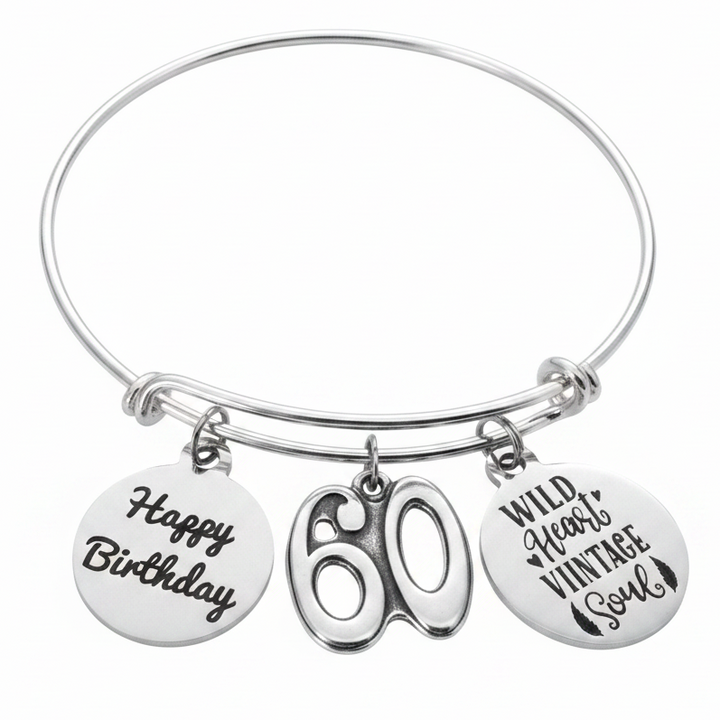 Silver expandable bangle bracelet with Happy Birthday round charm, silver 60 number charm, and Wild Heart Vintage Soul round charm — handmade by Jules Obsession
