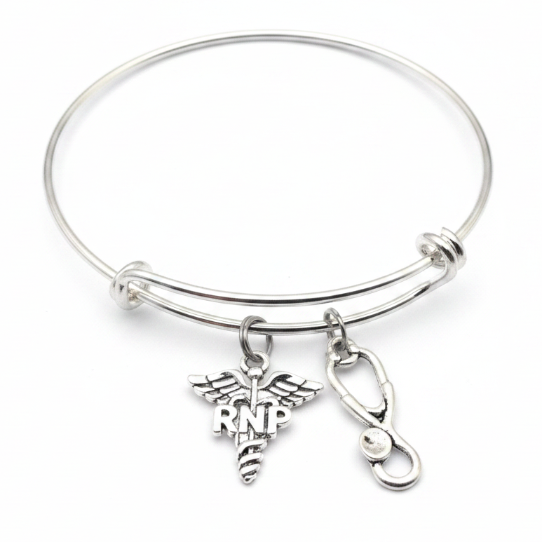 Silver expandable bangle bracelet with RNP caduceus charm and stethoscope charm on white background – Jules Obsession registered nurse practitioner gift jewelry