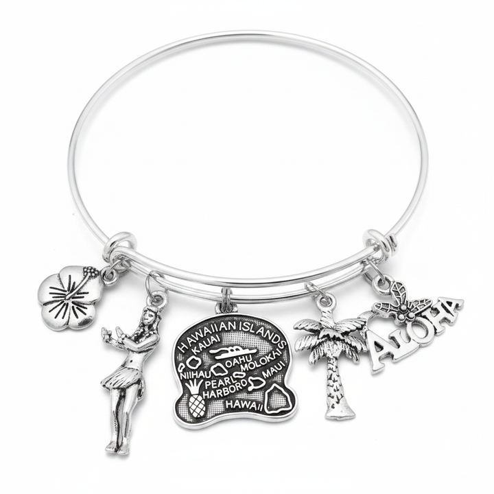Silver expandable bangle bracelet with hibiscus flower, hula dancer, Hawaiian Islands map disc, palm tree, and Aloha word charms on white background – Hawaii jewelry by Jules Obsession