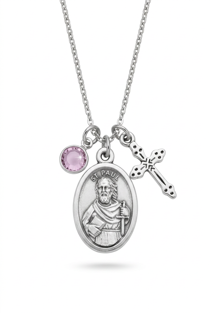 Saint Paul medal necklace with silver-tone cross and purple crystal birthstone on a white background.