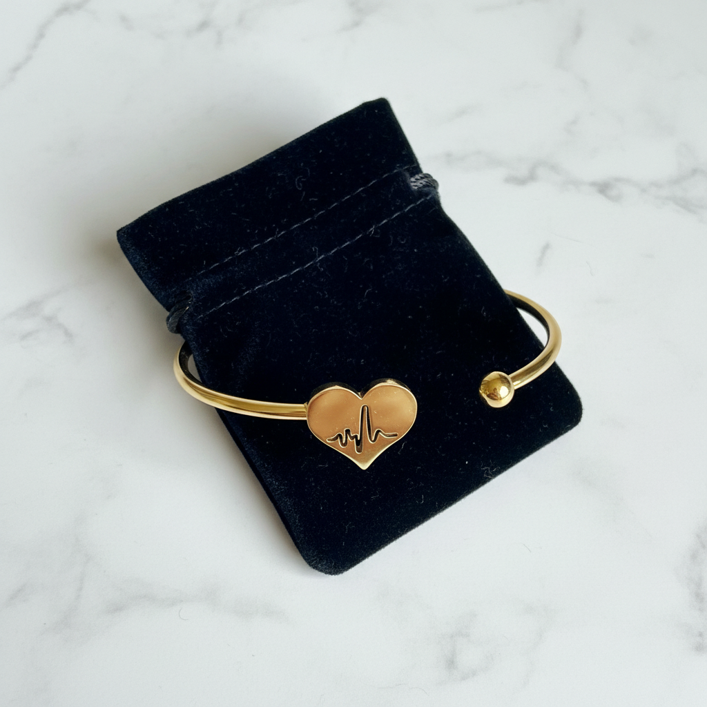 Gold EKG heartbeat cuff bracelet gift-ready in dark velvet jewelry pouch – nurse appreciation gift by Jules Obsession