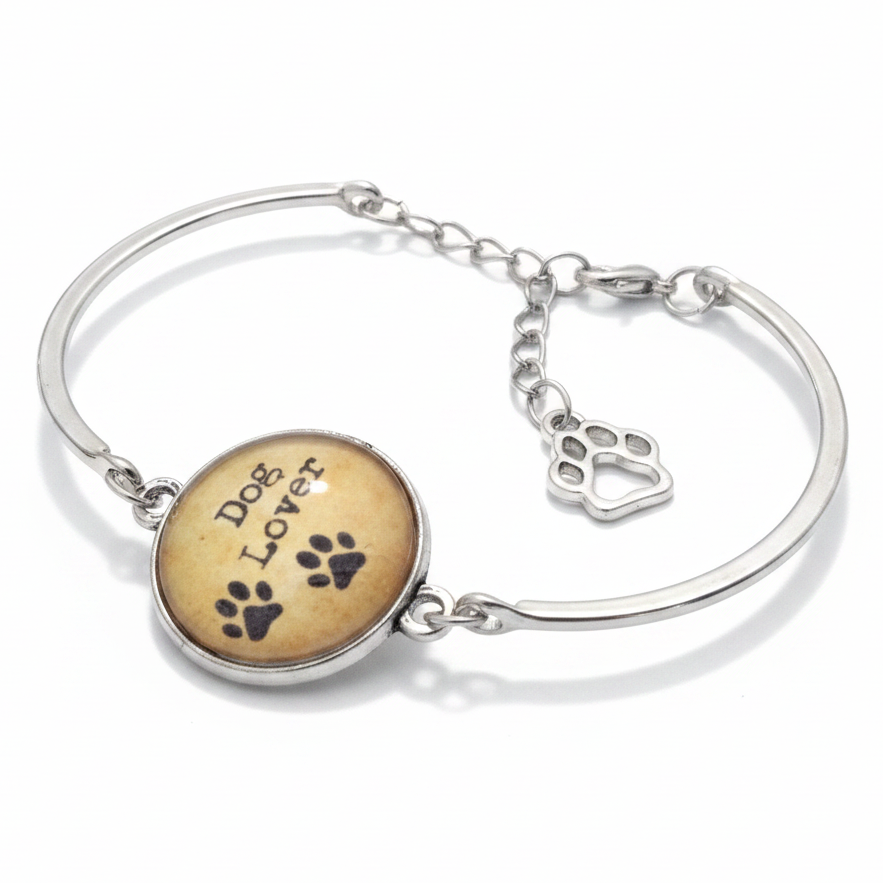 Dog Lover paw print vintage glass dome silver cuff bracelet with black enamel paw charm on white background – dog mom gift by Jules Obsession