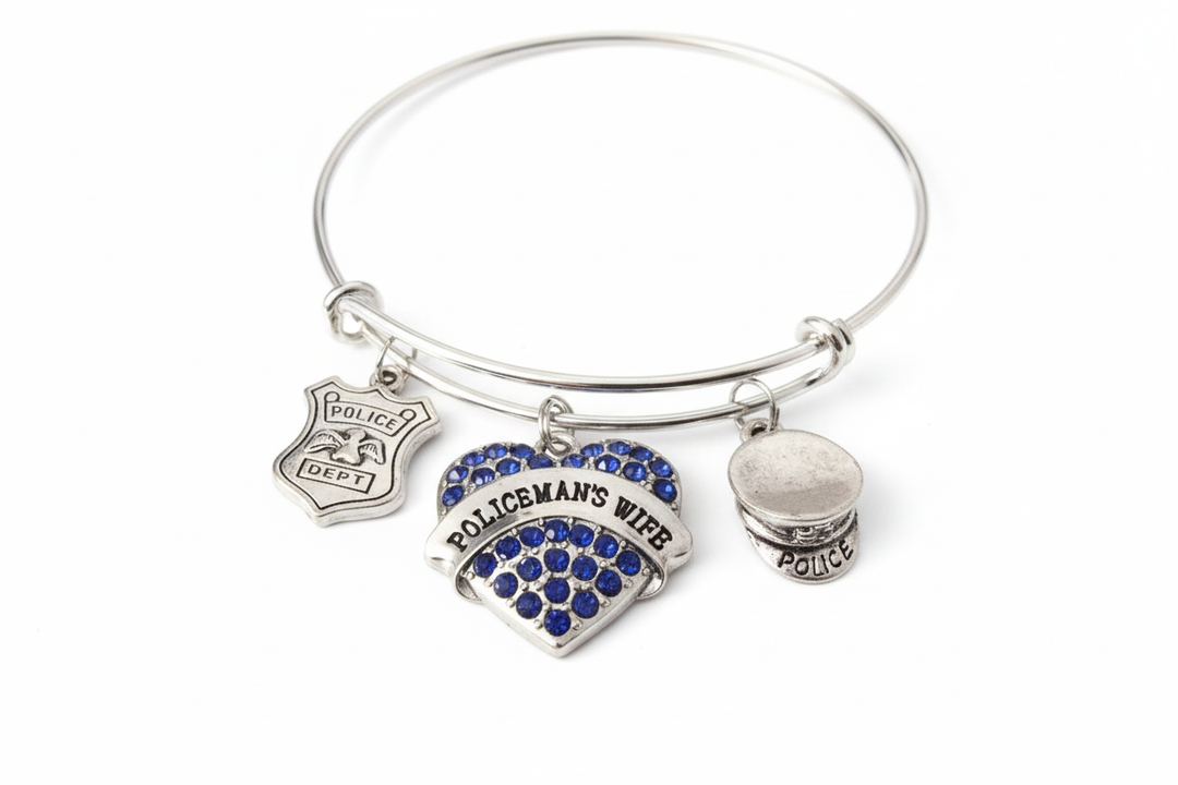 Police wife bracelet with sparkling blue crystal heart police badge and hat charms on bright silver expandable bangle thin blue line jewelry