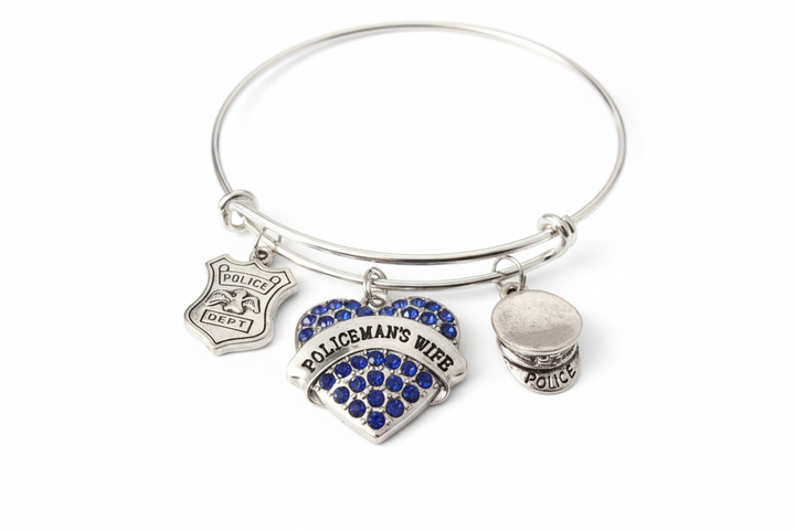 Police wife bracelet with sparkling blue crystal heart police badge and hat charms on bright silver expandable bangle thin blue line jewelry