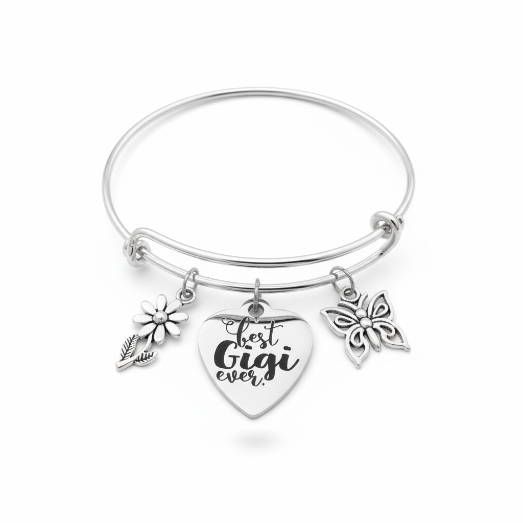 Silver expandable wire bangle bracelet with Best Gigi Ever engraved heart charm, daisy flower charm, and butterfly charm on white background – Jules Obsession