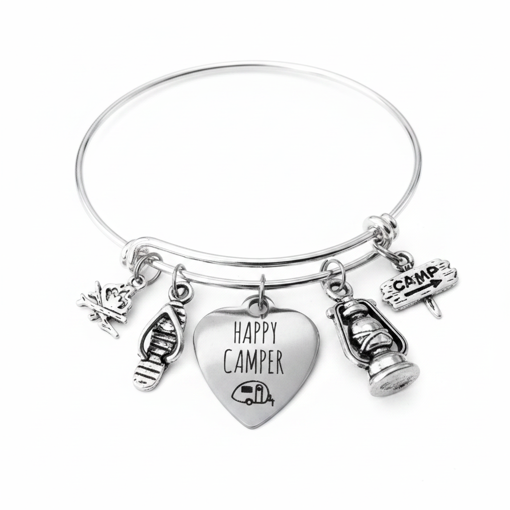 Professional white background studio photo of silver Happy Camper charm bracelet with camping charms including lantern, flip flop, campfire chair and rustic camp sign – camper gift jewelry