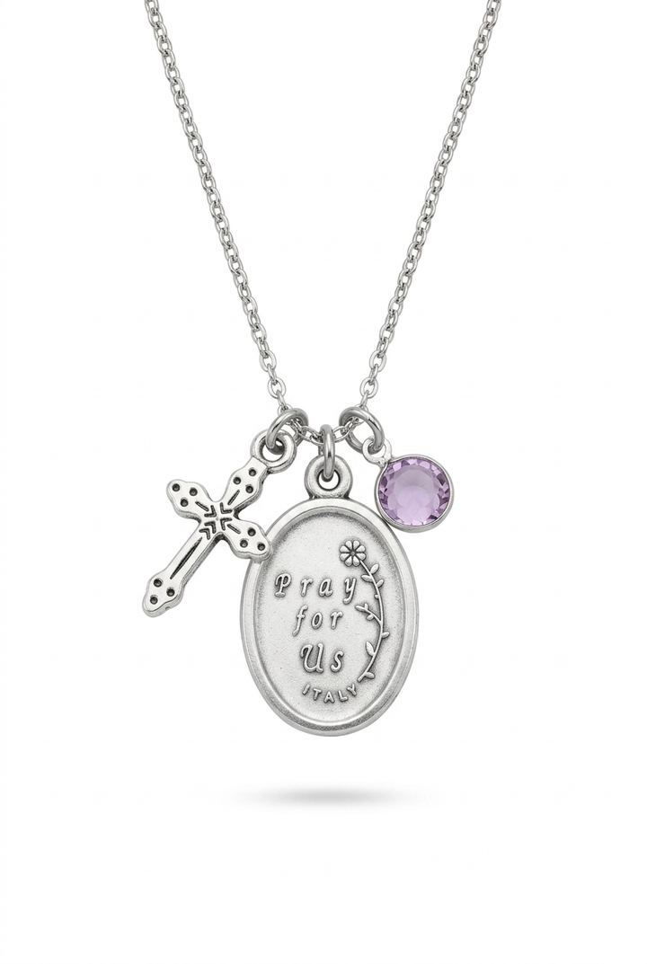 Back of Saint Paul necklace medal engraved Pray for Us, with cross and purple crystal birthstone on white.