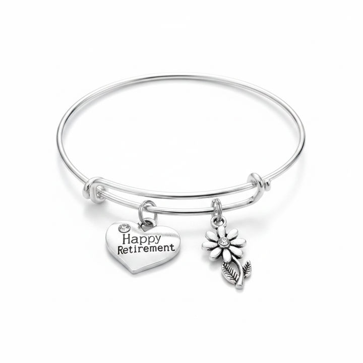 Silver expandable charm bracelet with Happy Retirement engraved heart charm and daisy flower charm – adjustable bangle retirement gift for women by Jules Obsession