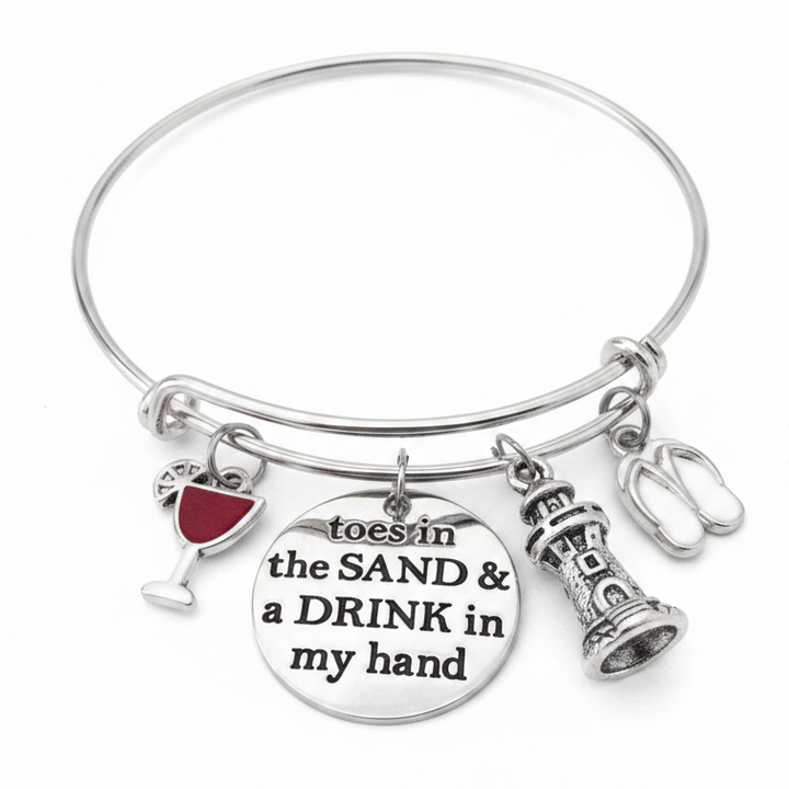 Toes in the Sand and a Drink in My Hand silver expandable charm bangle bracelet featuring engraved disc, red enamel wine glass, lighthouse, and white flip flop charms — Jules Obsession beach jewelry, made in USA