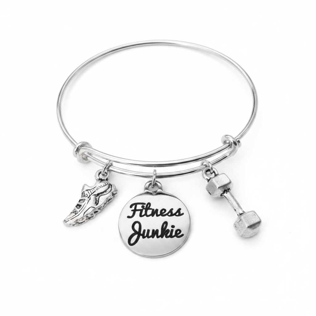 Silver expandable bangle bracelet with Fitness Junkie engraved disc charm, running shoe charm, and dumbbell charm on white background – Jules Obsession handmade gym and fitness jewelry gift for women
