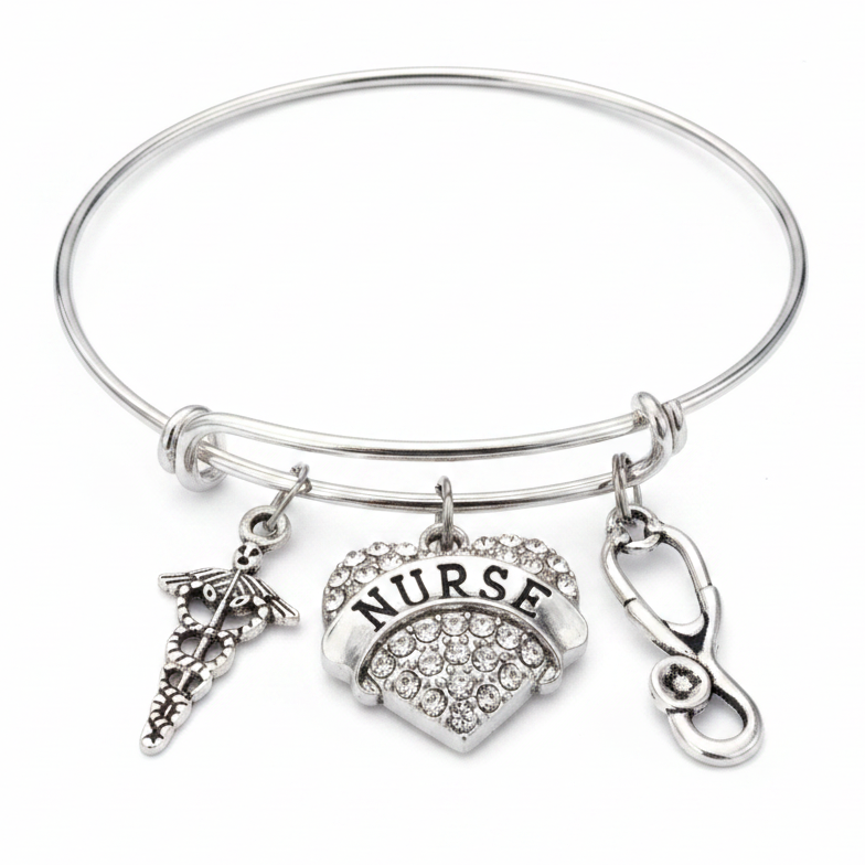 Silver expandable bangle bracelet with crystal rhinestone NURSE heart charm, caduceus charm, and stethoscope charm on white background – Jules Obsession nurse gift jewelry
