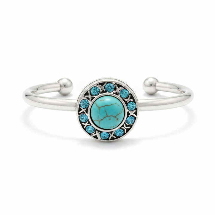 Turquoise cabochon and aqua crystal halo silver hinged snap cuff bracelet on white background – boho jewelry by Jules Obsession