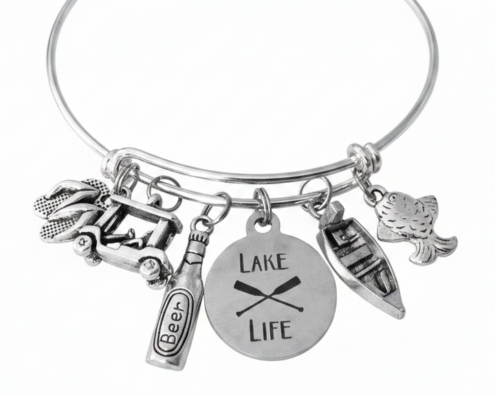 Lake Life expandable silver charm bangle bracelet featuring Lake Life engraved disc, jeep with kayak, beer bottle, canoe, and fish charms — Jules Obsession handcrafted jewelry, made in USA