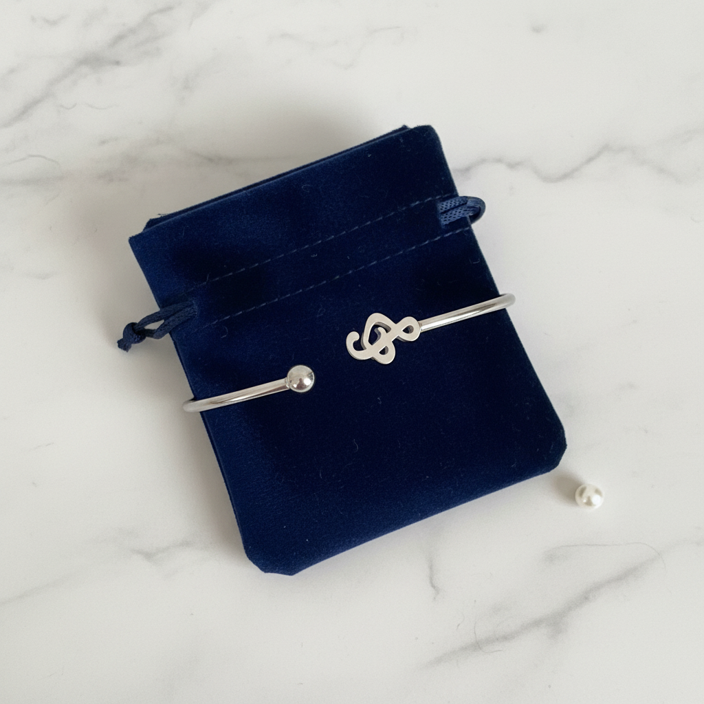 Treble clef stainless steel cuff bracelet gift-ready in dark velvet jewelry pouch – music note bangle by Jules Obsession