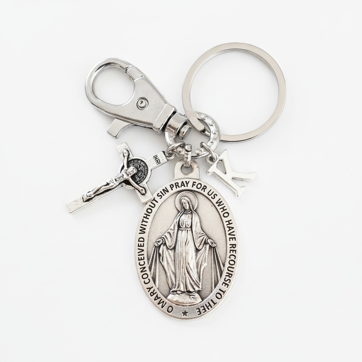 Silver Miraculous Mary keychain with crucifix and letter charm 