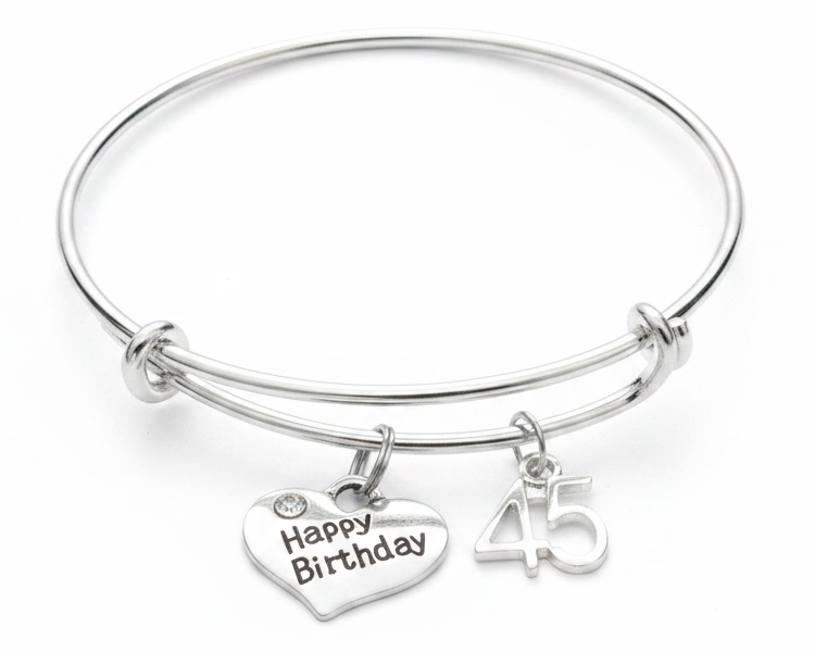 Silver expandable 45th birthday charm bracelet with Happy Birthday heart charm and 45 number charm on white background - Jules Obsession