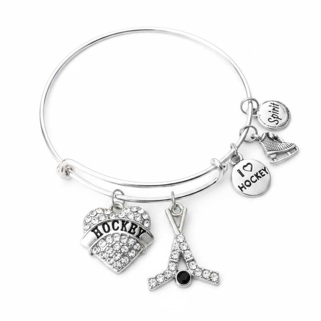 I Love Hockey silver expandable charm bangle bracelet with crystal heart charm, hockey sticks charm, ice skate charm, I Love Hockey disc charm, and Spirit charm on white background
