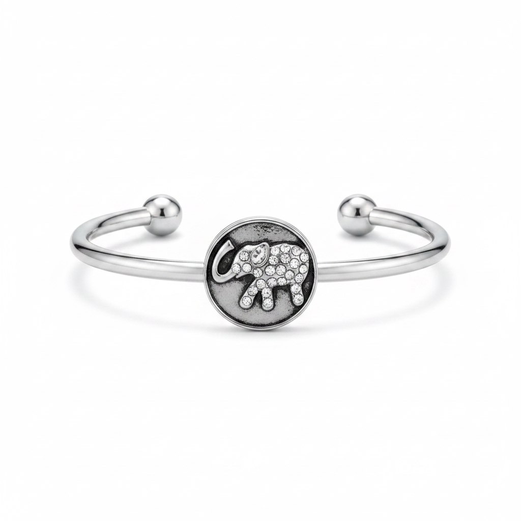 Elephant snap bracelet in surgical stainless steel with crystal rhinestone elephant charm on white background – Jules Obsession